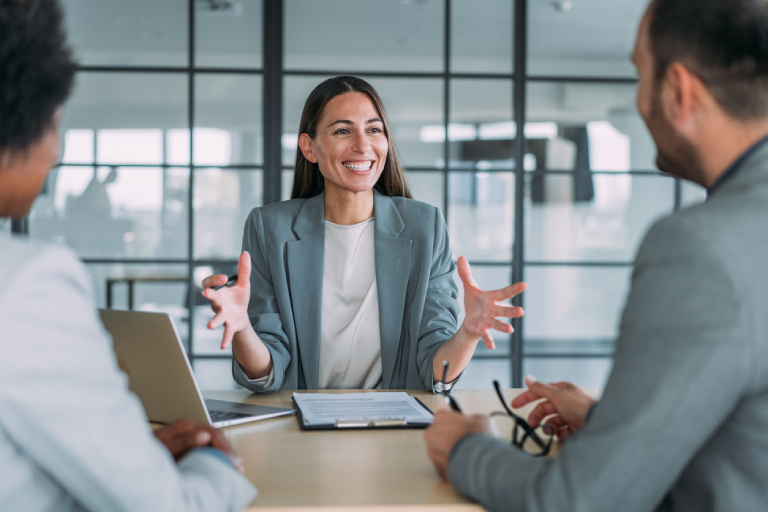 Financial advisor discussing investment strategy with married couple