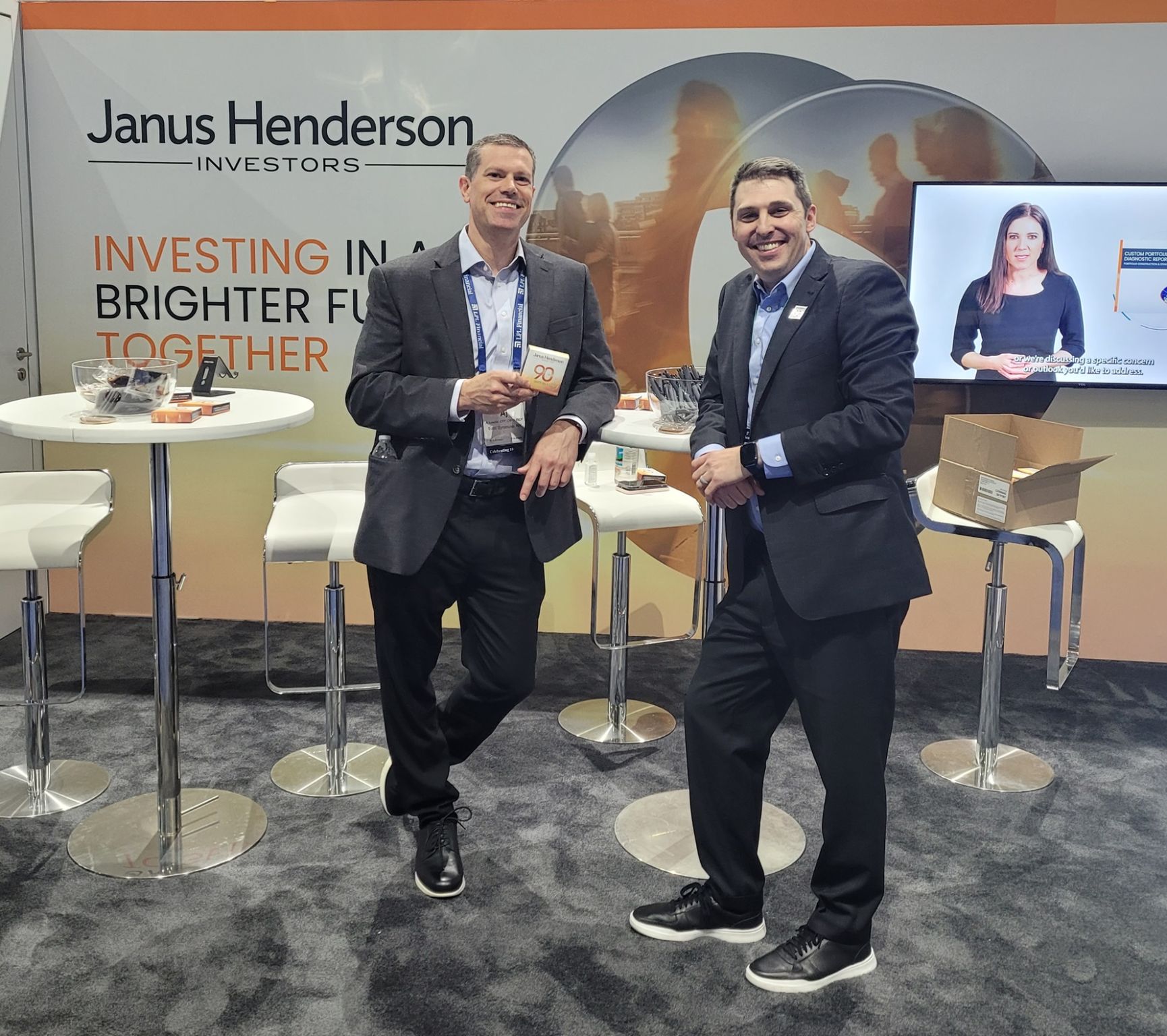 AJ of HighPoint Advisors, Syracuse NY, poses with a Janus Henderson representative at the LPL Focus Conference in San Diego
