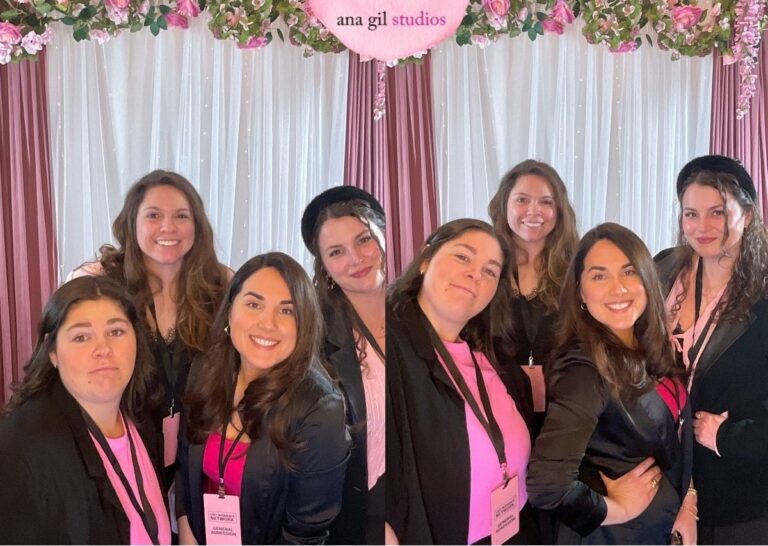 Taylor with her friends at the CNY Women's Summit, posing at a photo station by ana gil.