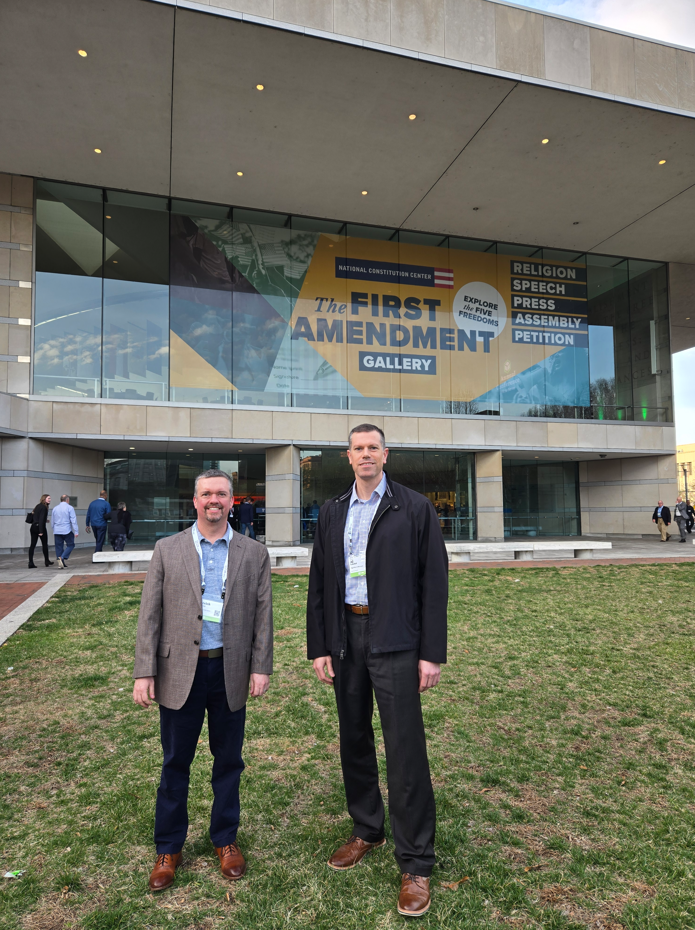 AJ and Pat of HighPoint Advisors, LLC in Syracuse, NY, pose in front of the National Constitution Center while attending the Private Advisor Group conference in Philadelphia.